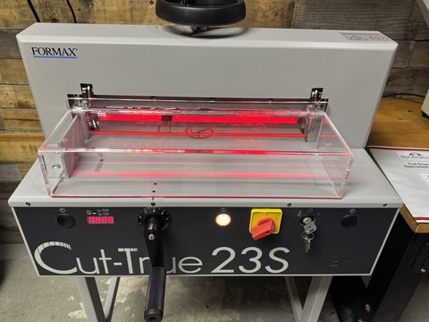 Formax Cut-True 23S paper cutter with its red safety light guard